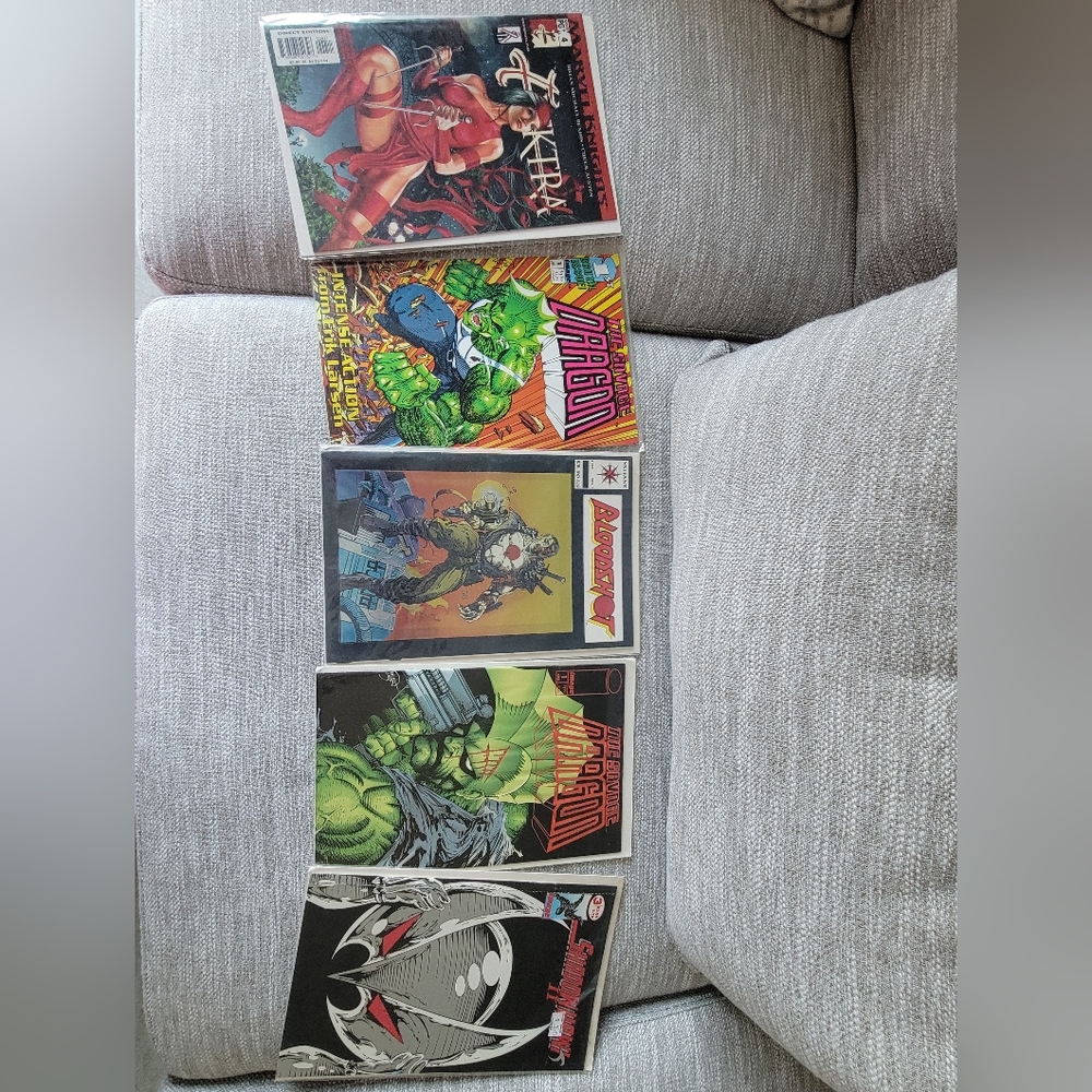 5 Comic Books.